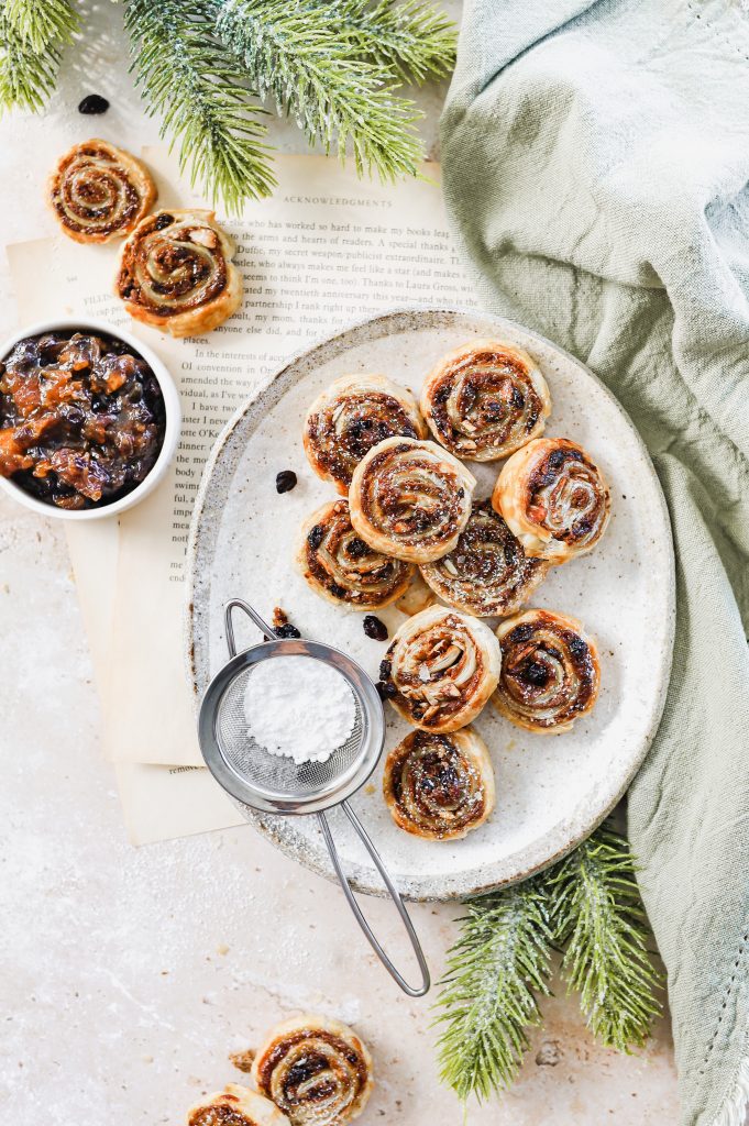 Layers of flakey golden puff pastry encase lashings of Barker's fruit mince, almond butter and cinnamon for these fruit mince cinnamon swirls. Ready in 30 minutes they are the perfect quick treat for your next Christmas get together.